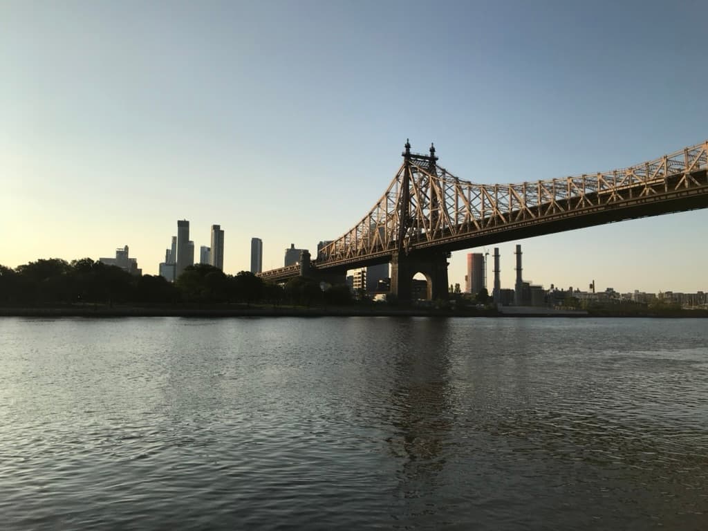 The Queensboro Bridge and Manhattan skyline at dusk